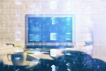 Multi exposure of desktop computer and technology theme hologram. Concept of software development.