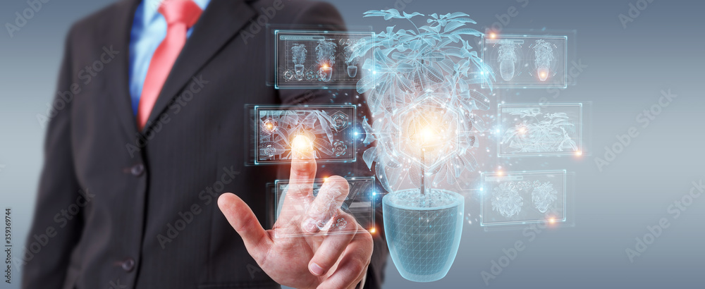 Leinwandbilder man holding and touching holographic projection of a plant with digital analysis 3d rendering