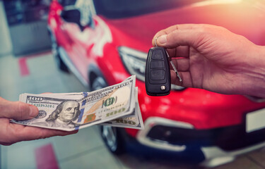 businessman buys a new car