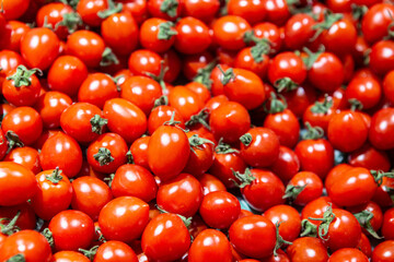 A pile of cherry tomatoes.