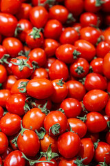 A pile of cherry tomatoes.