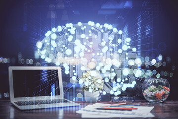 Multi exposure of work table with computer and brain hologram. Brainstorm concept.