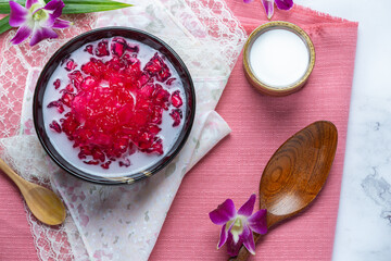 Simulated pomegranate in coconut syrup, cassava, Thai dessert.