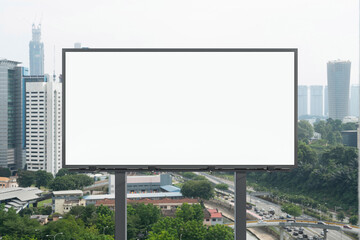 Blank white road billboard with KL cityscape background at day time. Street advertising poster, mock up, 3D rendering. Front view. The concept of marketing communication to promote or sell idea.