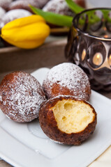 Fat Thursday homemade donuts on a plate, delicious Polish sweet food
