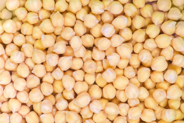 Background of the chickpeas soaked in cold water before cooking
