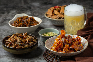 Beer with crispy fish hors d'oeuvres, World Beer Day.