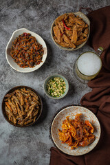 Beer with crispy fish hors d'oeuvres, World Beer Day.