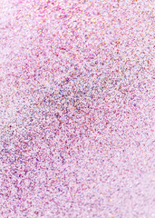 party, decoration and holidays concept - multicolored glitters on white background