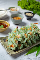 Steamed Shrimp Wontons Dim Sum with Raw Materials.