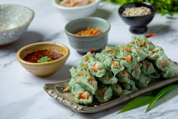 Steamed Shrimp Wontons Dim Sum with Raw Materials.