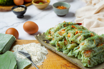 Steamed Shrimp Wontons Dim Sum with Raw Materials.