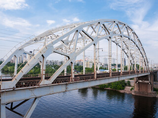 Steel arch truss of the railroad bridge across the river