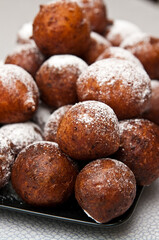 Fat Thursday homemade donuts on a plate, delicious Polish sweet food