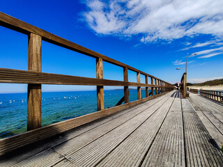 wooden bridge over the sea