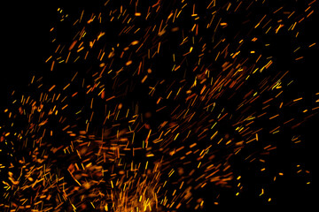 flame of fire with sparks on a black background