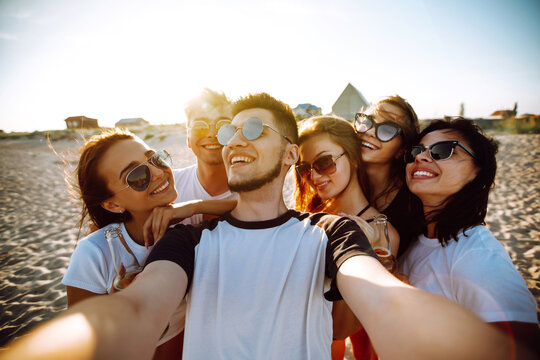 Group of young friends taking selfie, during summer vacation. Holidays, relax and lifestyle concept.