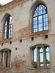Fototapeta premium fragment of the destroyed wall and Windows of an old German Church