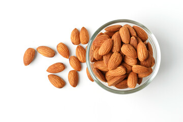 Almond in a clear cup the top corner shooting pile on the white background with clipping path suitable for product