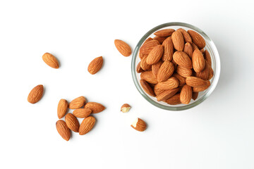 Almond in a clear cup the top corner shooting pile on the white background with clipping path suitable for product