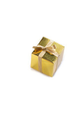 Beautiful sparkling golden gift box isolated on white background, present or surprise with beautiful bow space for text