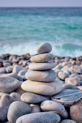 Fototapeta na wymiar Zen balanced stones stack on beach