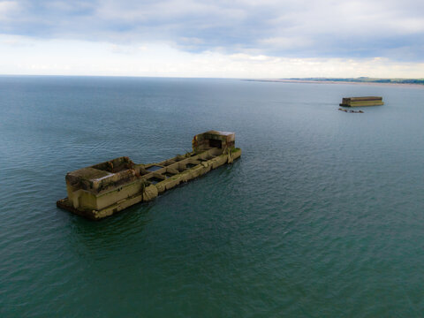 Ruins Of The Artificial Port, Buildt In Gold Beach, For The D-Day, In Normandy