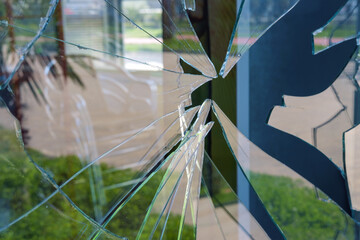 Blurred interior through the dusty broken glass