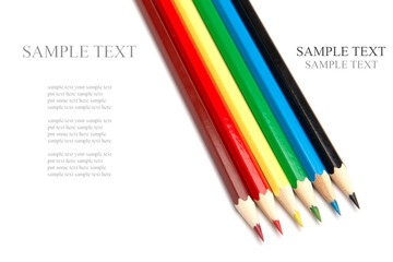A lot of colorful wooden pencils on a white background