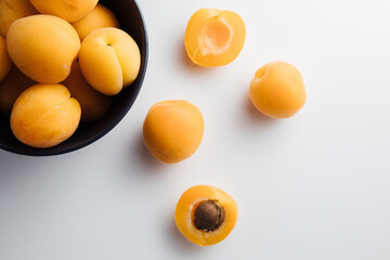 Close-up of ripe peaches on the table. Ripe peaches with leaves