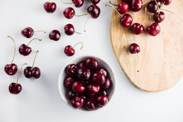 Close-up of a cherry tree on a wooden Board. Fresh berries