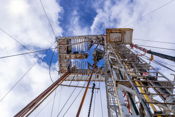 Drilling rig in oil field for drilled into subsurface in order to produced crude, inside view....