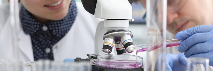 Laboratory assistants conduct chemical examination. Introduction laboratories into everyday...