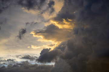 Dramatic cloudscape of storm clouds at sunset