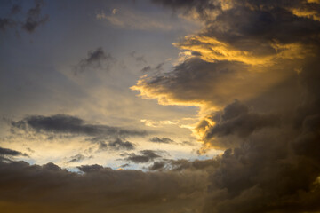 Dramatic cloud formations at sunset