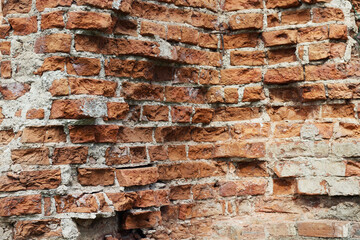 The brick wall of an old building