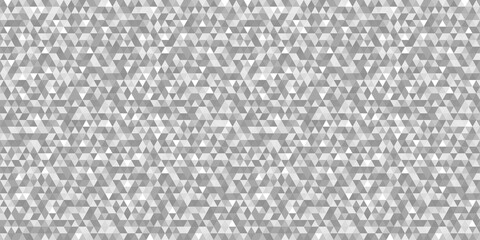 Tiled pattern from triangles. Seamless abstract texture. Triangle multicolored background. Black and white illustration. Print for polygraphy, banners and textiles