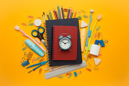 Back to school, items on yellow background. Welcome to learning. Sale accessories for knowledge, retail. Study shopping. - Powered by Adobe