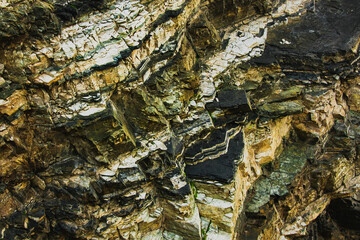 The texture of the stones in layers and a background texture of a stone.