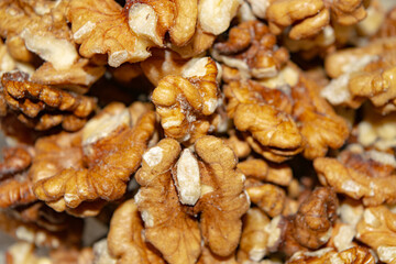 Peeled walnuts close-up. Surface texture. Healthy diet.
