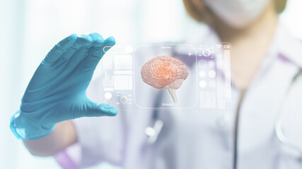 Doctor hand hold transparent tablet display showing brain in screen