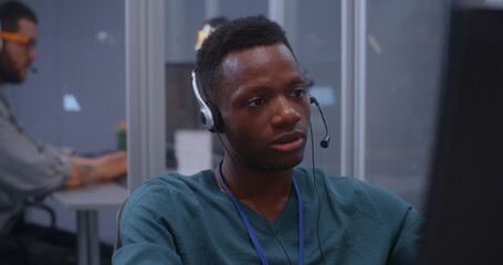 Young man working in data center