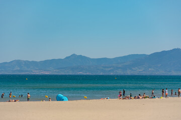 Fototapeta na wymiar Sunny day in the tourist town of Canet en Roussillion in France on the Mediterranean Sea.