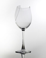 Broken wine glass isolated on white background