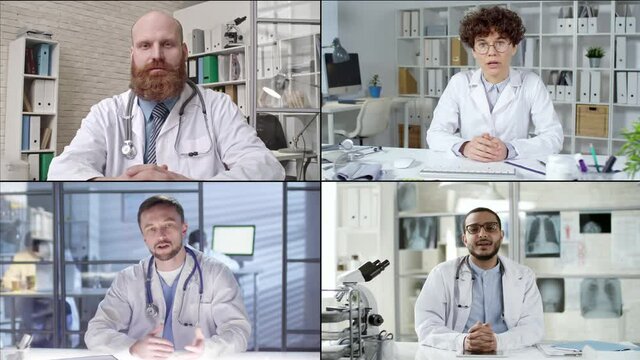 Split Screen Shot Of Four Doctors In White Coats Sitting At Their Desks And Talking On Video Call