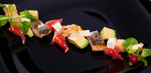 Salad with trout, vegetables, cheese