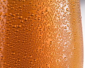 Cooled glass of beer close-up.  Small water drops on cold glass surface.
