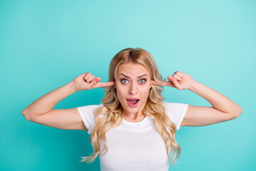 Portrait of astonished girl close cover finger ears dont wont listen unbelievable unexpected novelty shout wear good look clothes isolated over green color background