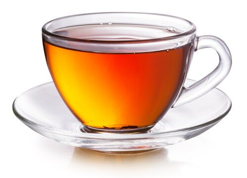 Glass cup with black tea isolated on a white background.
