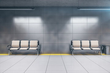 Chairs in modern underground railway station.